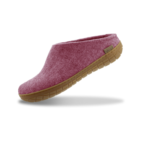 Blossom slipper with leather sole on a white background